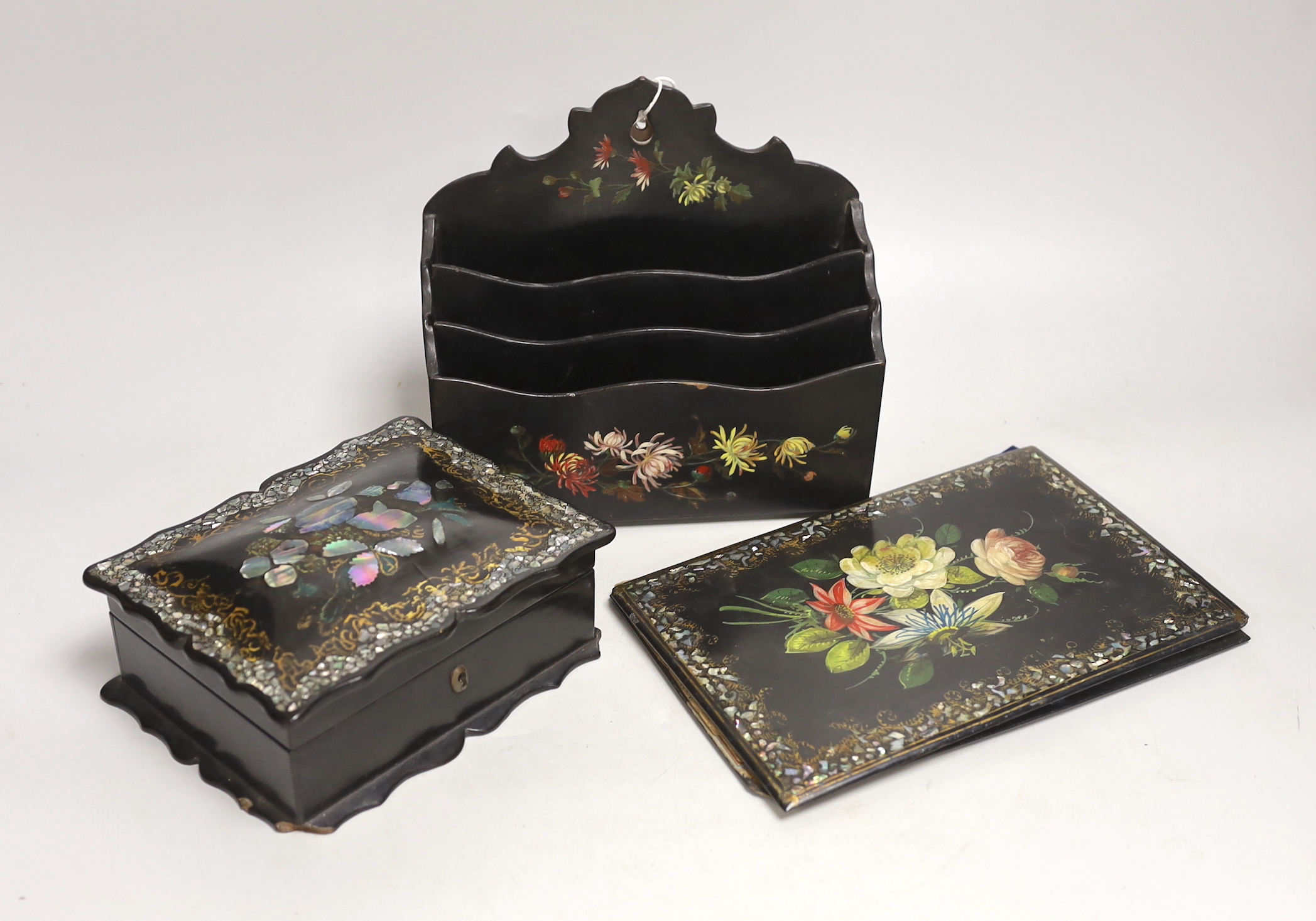A Victorian mother of pearl papier mache box and blotter and a similar letter rack, box 17.5cm wide, 13cm deep